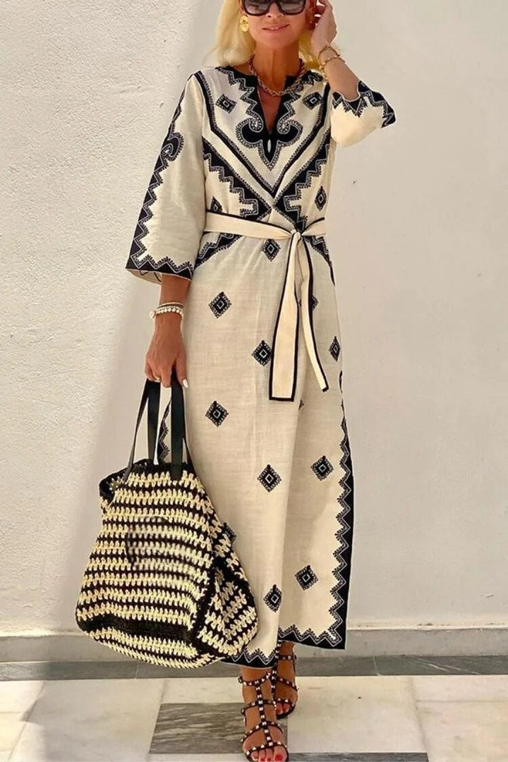 Xaviera – Embroidered Belted Maxi Dress